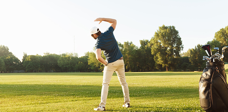 Golfer strecthes